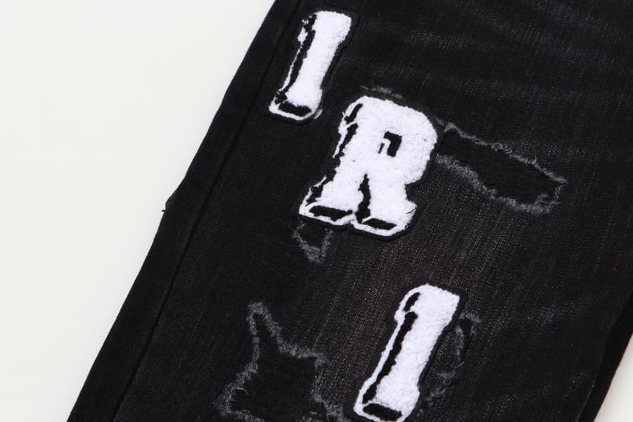 Calça Amiri Distressed Varsity Logo Jeans
