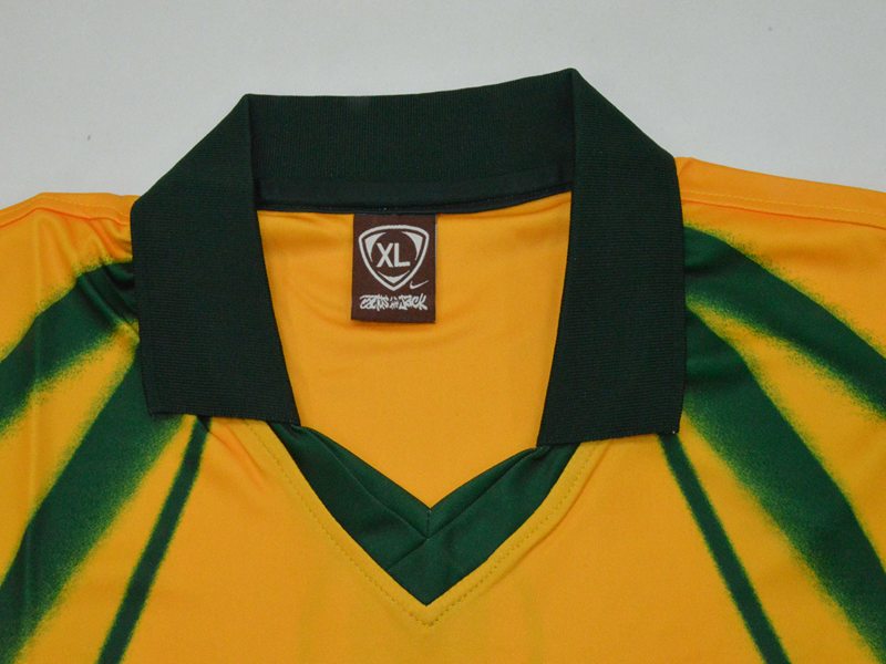 Camiseta Cactus Jack x Nike Brasil Total 90 Retro Jersey Yellow