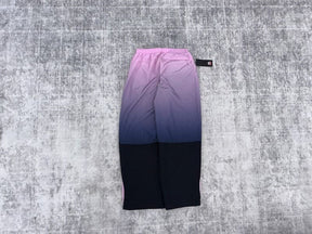 Conjunto Supreme x Umbro Gradient Track Pink