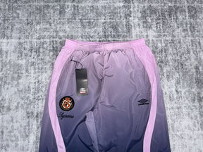 Conjunto Supreme x Umbro Gradient Track Pink