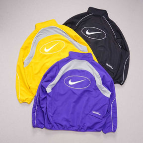 Jaqueta Supreme x Nike Track Yellow