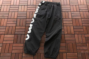 Conjunto Supreme Spellout Track Black