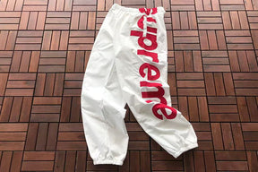 Conjunto Supreme Spellout Track White