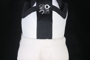 On Running Cloudsolo x Loewe Black Eggshell